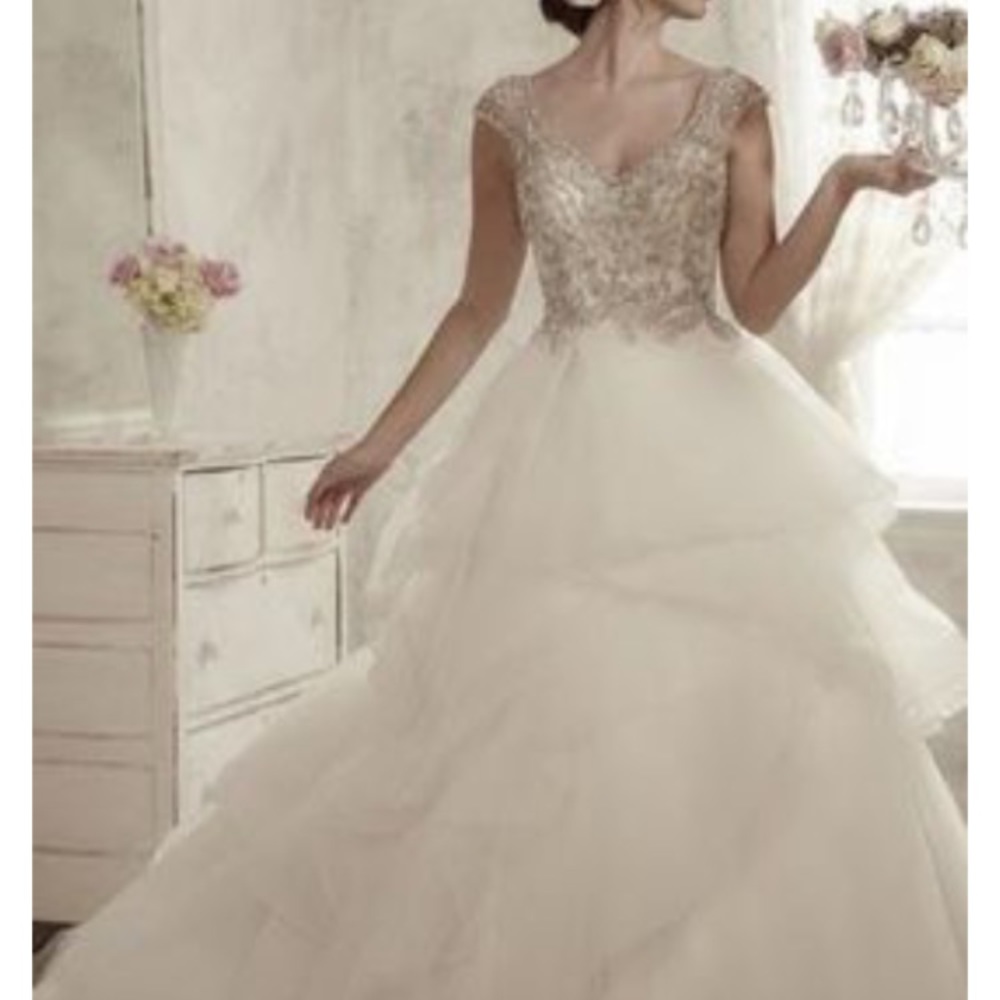 Wedding dress only worn for ceremony!!!